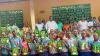 Okper Chief supports eight schools with learning materials, urges greater investment in education 