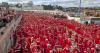 Hundreds of Kate Bush lookalikes turn Kent beach red for Wuthering Heights event