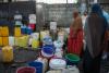 Queuing at dawn as Comoros taps run dry
