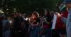 People gather to mourn victims of fatal Seattle Center shooting