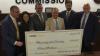 WVU Medicine presents $9 million to Mon County Commission for county public health initiatives