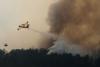 Spain allows wildfire evacuees to return but France fears flames spreading