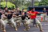 Soldiers, College Football Players Forge Teamwork in Hawaii