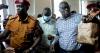 Ugandan opposition figure Besigye collapses in the dock during treason trial