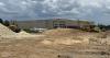 What is under construction near the Interstate 10-Pecue Lane exit?