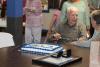 ‘We’re still here’: 100-year-old WWII veteran receives honor for service and longevity