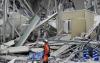 Japan ‘races against time’ to reach people trapped after quake