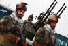 Iraqi armed faction threatens retaliation after deadly strikes