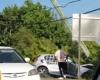Driver unconscious after smashing into pole