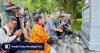 Why did an Okinawan delegation visit a Beijing cemetery amid China-Japan tensions?