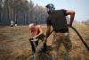 France firefighters hopeful, as Spain reports 'almost no flames'