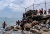 Italy wants Spain suspended from Schengen zone after thousands breach Morocco’s border to cross over to Ceuta