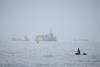 AP News: US and Iran trade missile barrages as hopes dim for a quick resolution to the five-month conflict