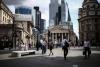 Stocks diverge on earnings as oil steadies