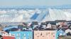 Watch: Giant iceberg turns over near  Greenland's coast