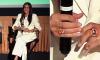 Meghan rings the changes with a new £2,100 diamond-studded Oura fitness tracker on her left hand - and a mystery gold band on the right...while leaving off her engagement ring for the 4th month running