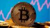 Bitcoin trades near $64,000 after Fed pause; Crypto market awaits next move