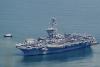 Day after Russian sub leaves Cam Ranh, U.S. nuclear carrier docks in Danang