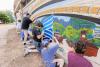 UW-Stout Polytechnic students, staff help turn community into a canvas during Murals in Menomonie