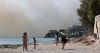 Wildfires kill three and force thousands out across southern Europe