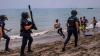 Spain deploys military to Ceuta after thousands of people breach Morocco's border, at least nine die