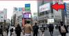 New service lets Tokyo tourists display their faces on giant screen at Japan’s busiest intersection