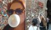 US trend for sticking chewing gum at tourist sites lands in Europe's historic cities - but doctors warn visitors they're creating 'walls of bacteria'