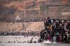 Spain deploys military after some 50,000 Moroccans invade its North African enclave