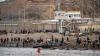 Thousands of migrants cross into Spain's north Africa enclave