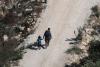 Israeli military cracks down on West Bank village as settlers march in