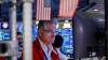 Wall Street gains on tech earnings; bond yields hit multi-year highs