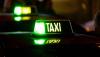 Why are some people with HIV still being barred from driving taxis in Spain?