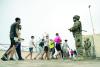 Spain says border migrant surge reverses