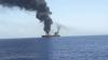 An oil tanker was hit by an unidentified projectile off the coast of Oman amid escalating tensions in the Strait of Hormuz