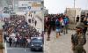 'People are dying here': Migrants who broke into Europe tell other Moroccans to stay at home as Spain erects massive inflatable barriers in bid to stop 60,000-strong 'invasion'