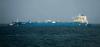 Tanker damaged by unknown projectile off Oman amid Hormuz tensions