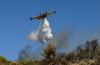 Firefighters in Greece struggle to save coastal resort as violent winds rage