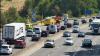 Car and caravan fire closes lanes on M25