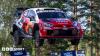 Evans third after roll as Ogier taken to hospital