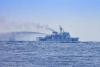 China stages military drills near contested South China Sea shoal