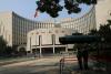 China's central bank pledges timely policy tool adjustment