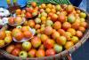 Tomato, cooking oil prices rise in mid-July, but pork, rice prices fall