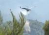 (VIDEO) Firefighting Helicopters Collide Near Athens as Greece Battles Wind-Driven Wildfires, Search Underway
