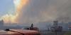 Thousands evacuate as wind-driven wildfires explode near Spokane amid rare fire weather emergency