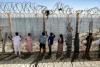 World AFP Moroccans gather at Ceuta border, desperate for news of loved ones