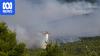 Two firefighting helicopters collide midair fighting blazes in Greece