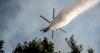 Choppers collide, killing 2, as fires and foreboding grip Greece