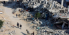 Israel kills 18 in Gaza, raids West Bank