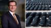 Under siege: Car giant cuts 8,000 jobs