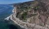 Breathtaking beachfront mansions sit vacant after historic natural disaster… now they're being 'discounted' but buyers still don't want in